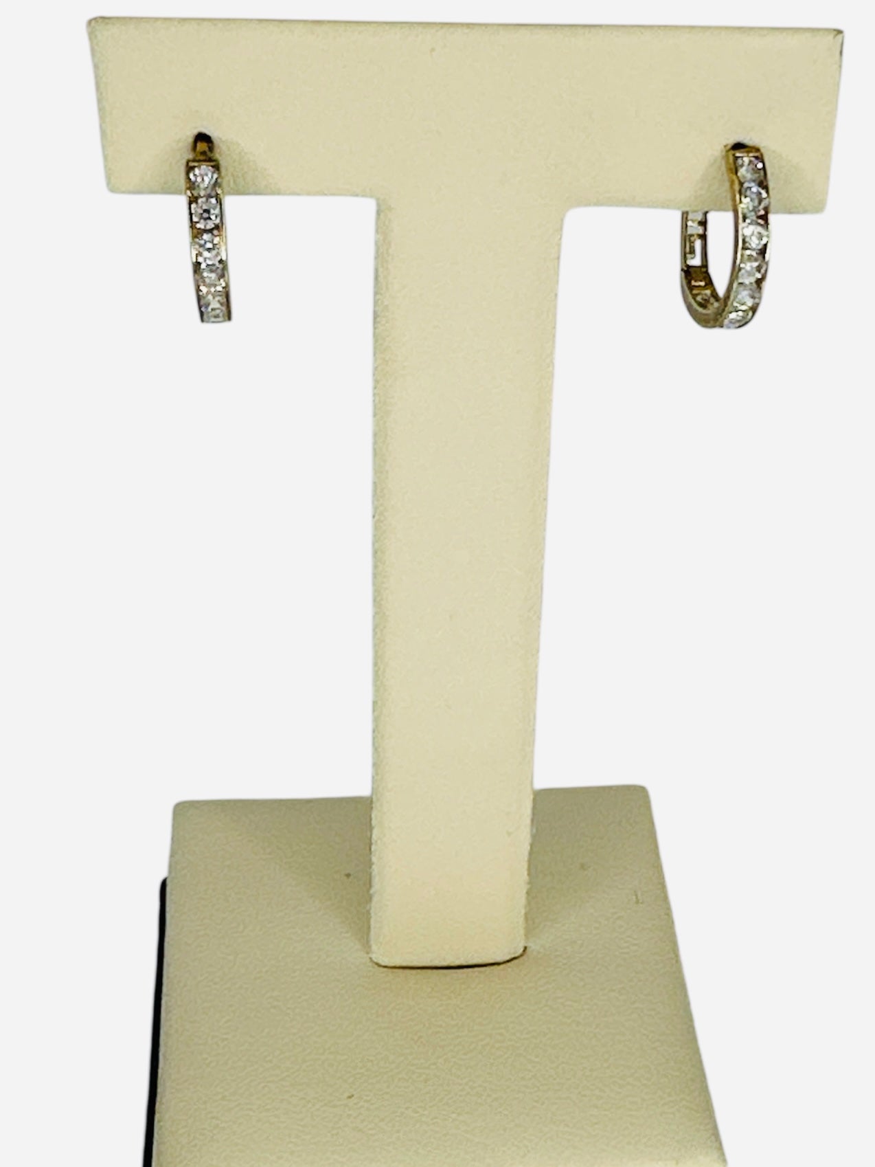 pendiente con piedras blanca 10k 1.8g